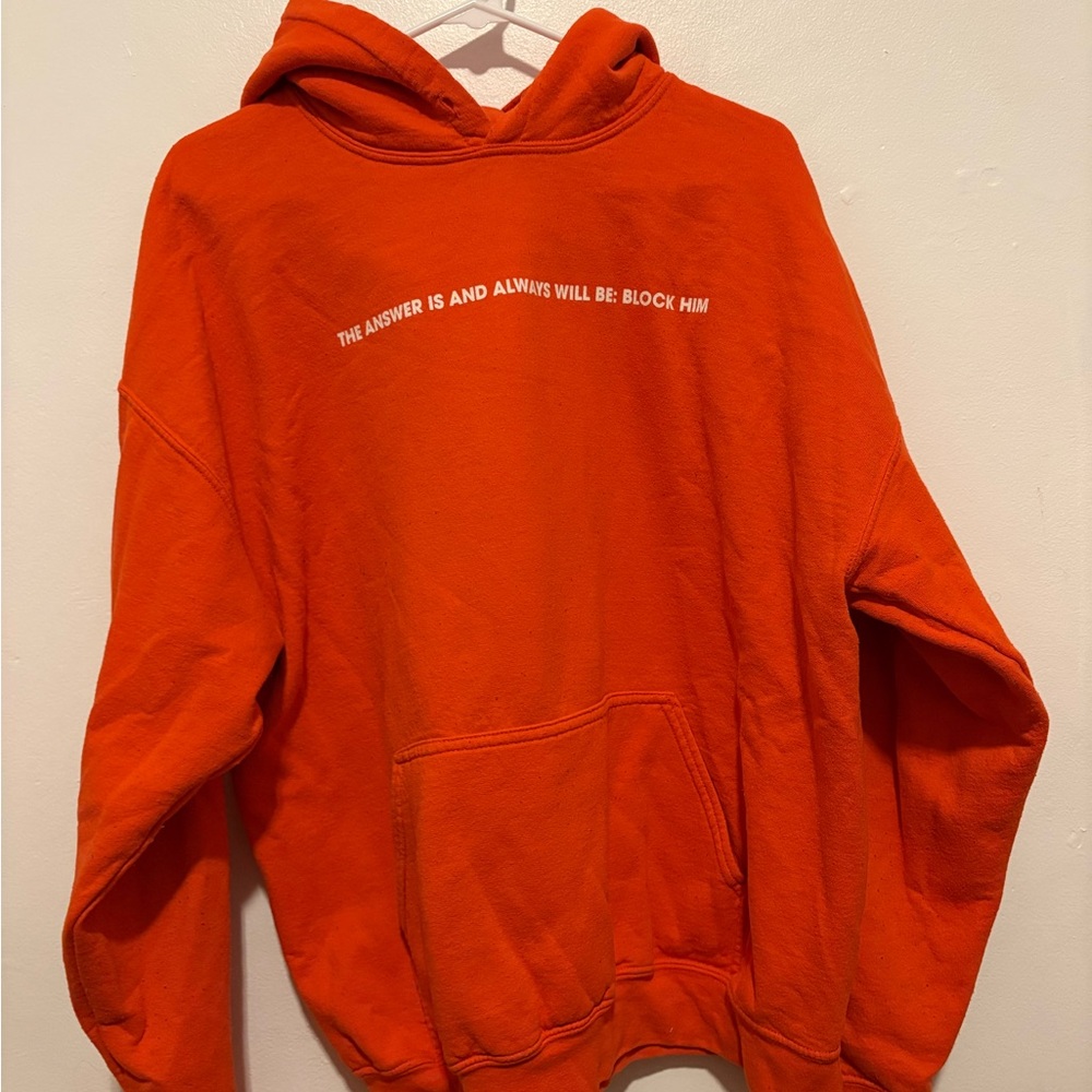 Orange Graphic Call Her Daddy Hoodie | The answer is and always will be blockhim